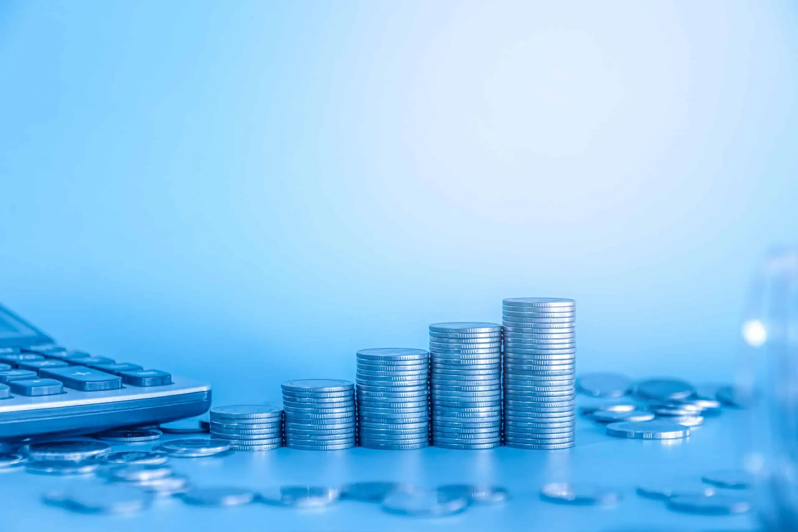 Mortgage financing – coins and calculator